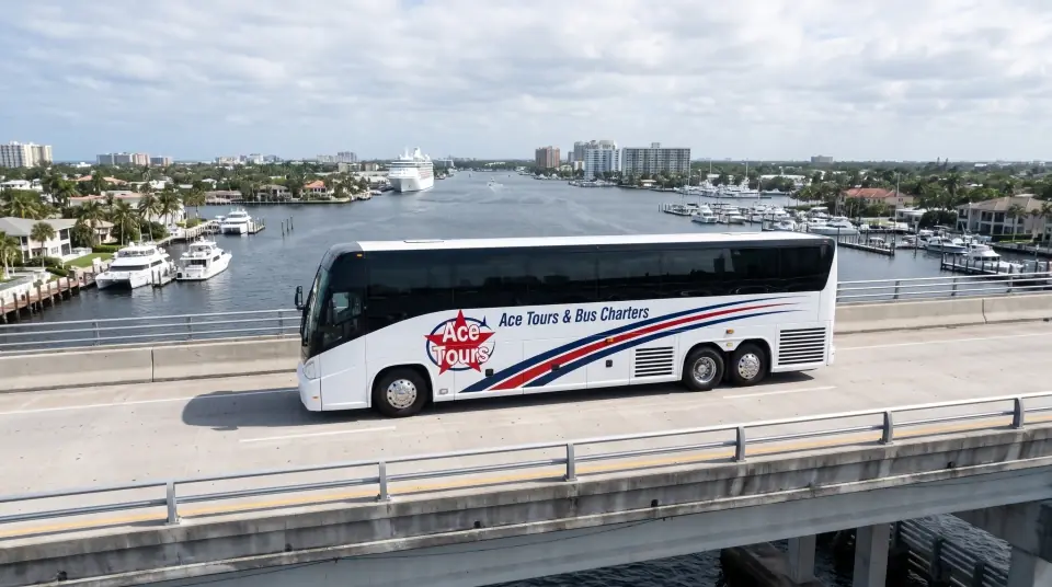 Illustration of a white Ace Tours & Bus Charters motorcoach crossing a Fort Lauderdale bridge over the Intracoastal Waterway with yachts moored below