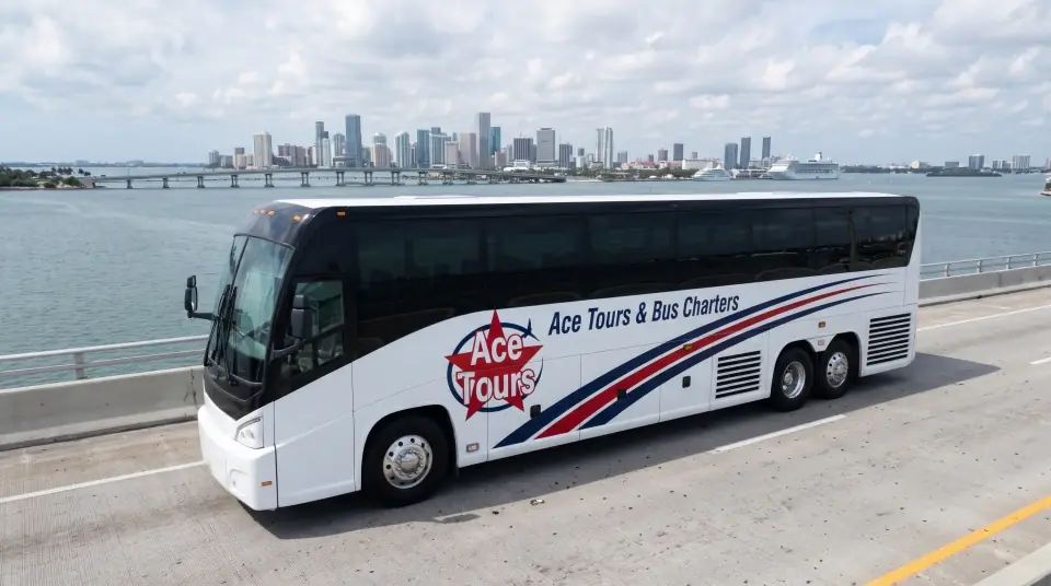 Illustration of a white Ace Tours & Bus Charters motorcoach crossing a bridge over Biscayne Bay with the downtown Miami skyline behind