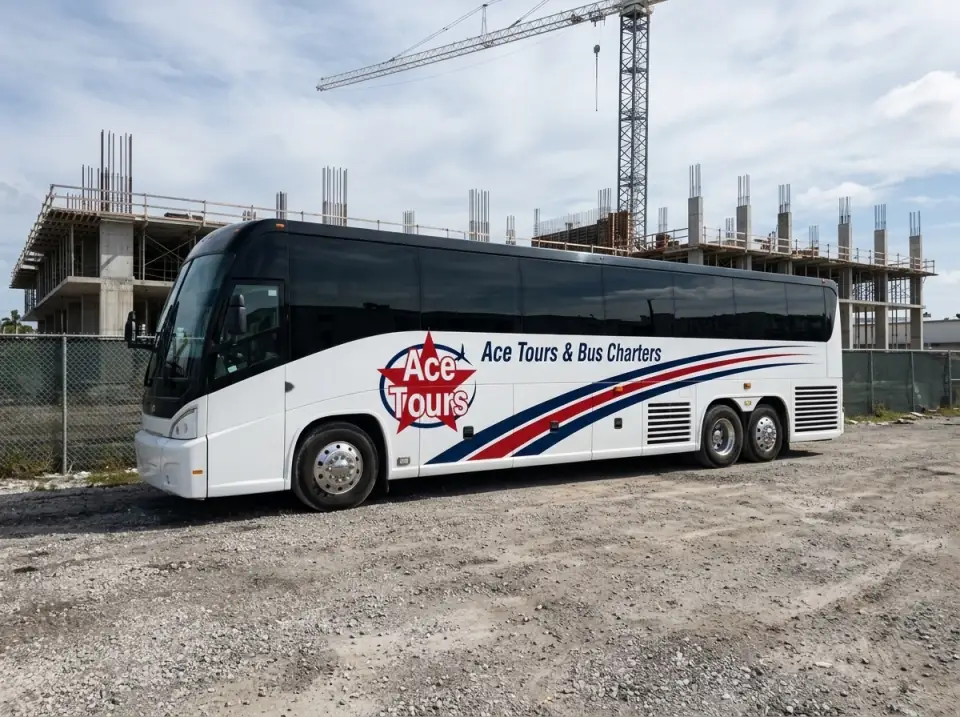 Illustration of a white Ace Tours & Bus Charters motorcoach parked on a gravel lot beside a construction site, a half-built concrete building and a tower crane behind