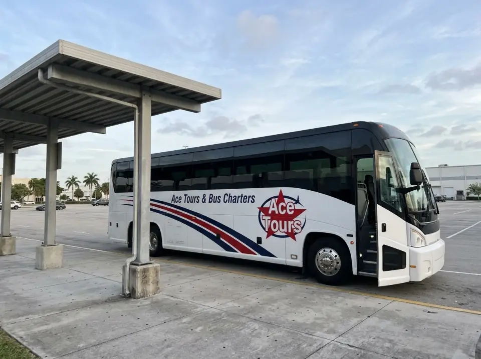 Illustration of a white Ace Tours & Bus Charters coach waiting with its door open at a covered pickup shelter in a large employee parking lot in Doral, Florida