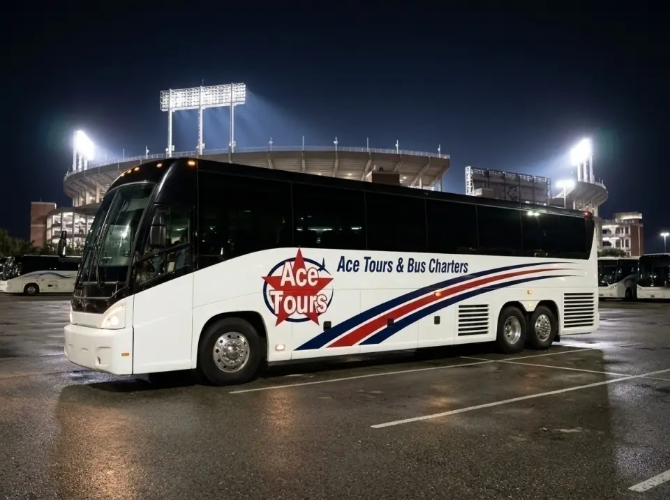 Illustration of a white Ace Tours & Bus Charters motorcoach parked in a stadium coach lot at night, bright stadium floodlights glowing behind it
