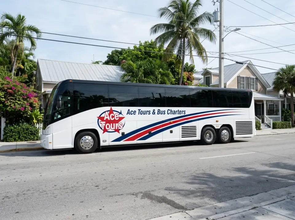 Illustration of a white Ace Tours & Bus Charters motorcoach parked on a wide palm-lined street at the edge of Old Town Key West, side view