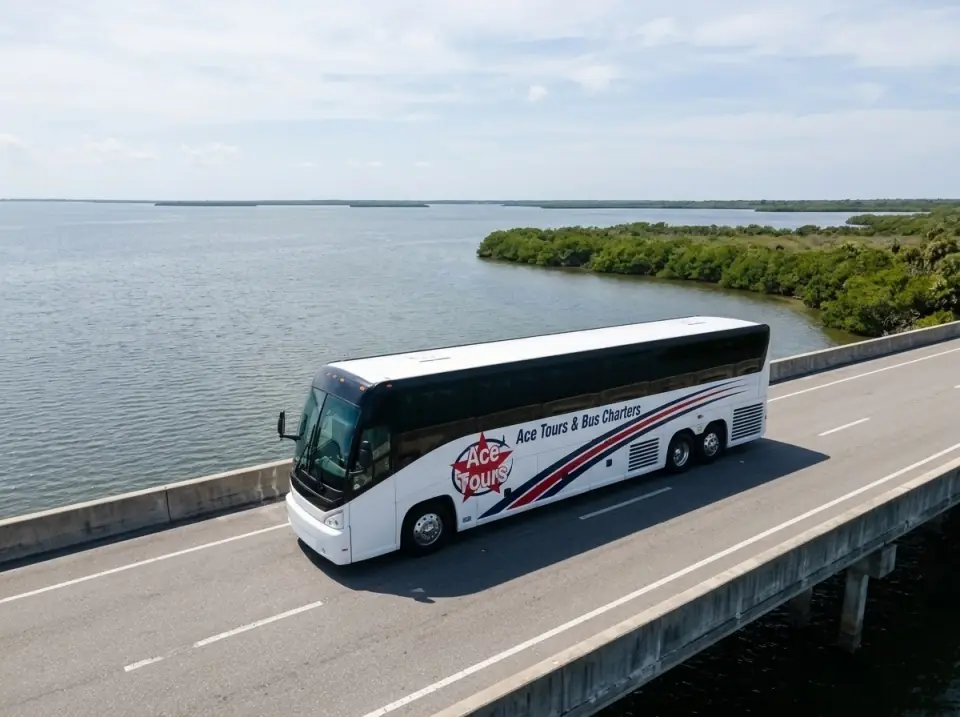 Illustration of an Ace Tours motorcoach crossing a bridge over the Banana River, calm water and mangroves below