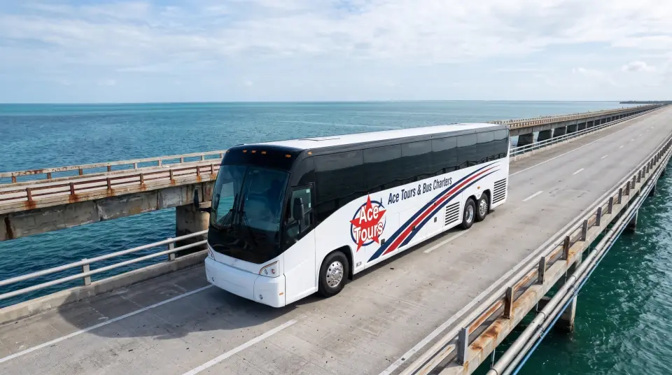 Illustration of a white Ace Tours & Bus Charters motorcoach crossing the Seven Mile Bridge in the Florida Keys, turquoise water and the old bridge alongside, seen from above