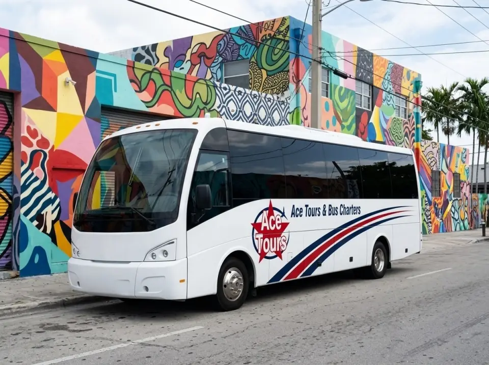 Illustration of a white Ace Tours & Bus Charters minibus parked outside a Wynwood warehouse painted with colorful abstract murals