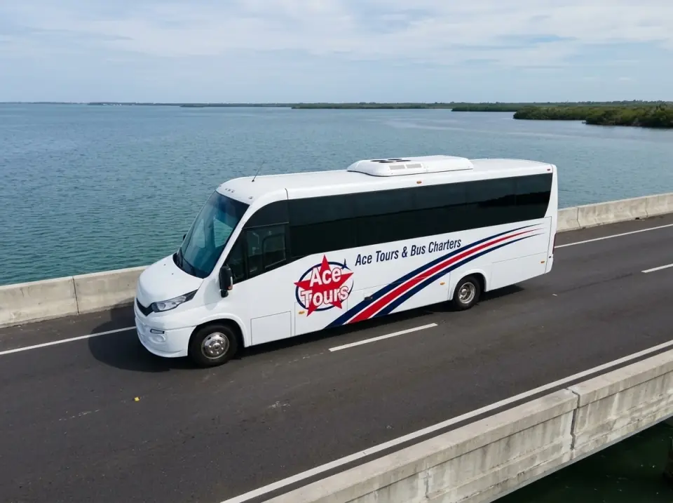 Illustration of a white Ace Tours & Bus Charters minibus on a bridge over the calm Indian River Lagoon near Stuart, seen from a low drone angle