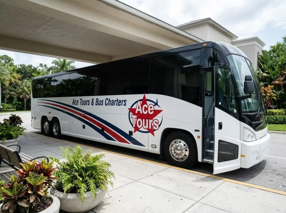 Illustration of a white Ace Tours & Bus Charters motorcoach under the covered entrance canopy of a South Florida community center, door open beside the curb